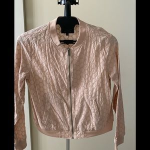 Sanctuary eyelet bomber jacket.  Anthropologie.